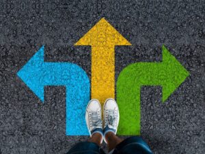 Landlord’s Guide to The Eviction Process: What You Need to Know 2 Man standing on road with three arrow choices