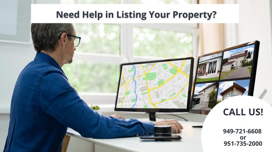 man sitting in front of a desktop computer monitor looking at a map