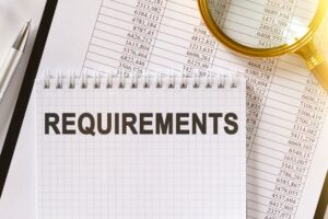 REQUIREMENTS text in a notebook with lens